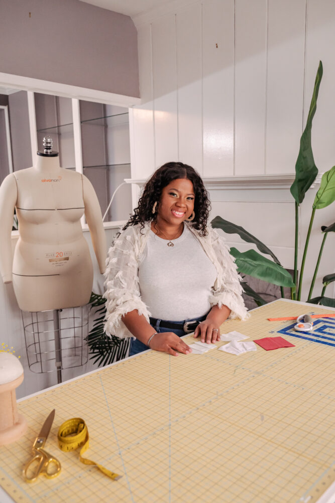 portrait of fashion designer at sewing studio