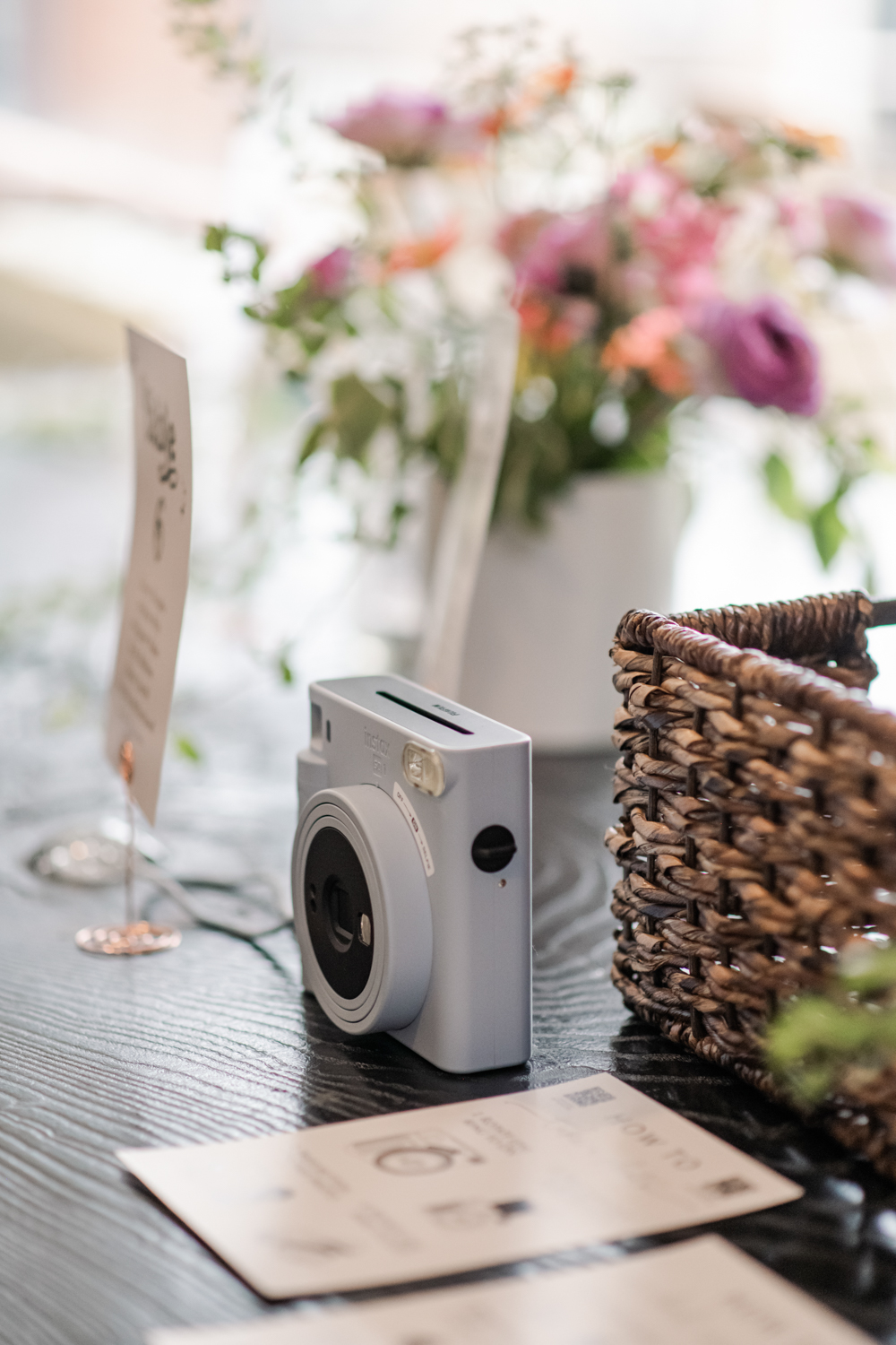 polaroid camera at wedding reception