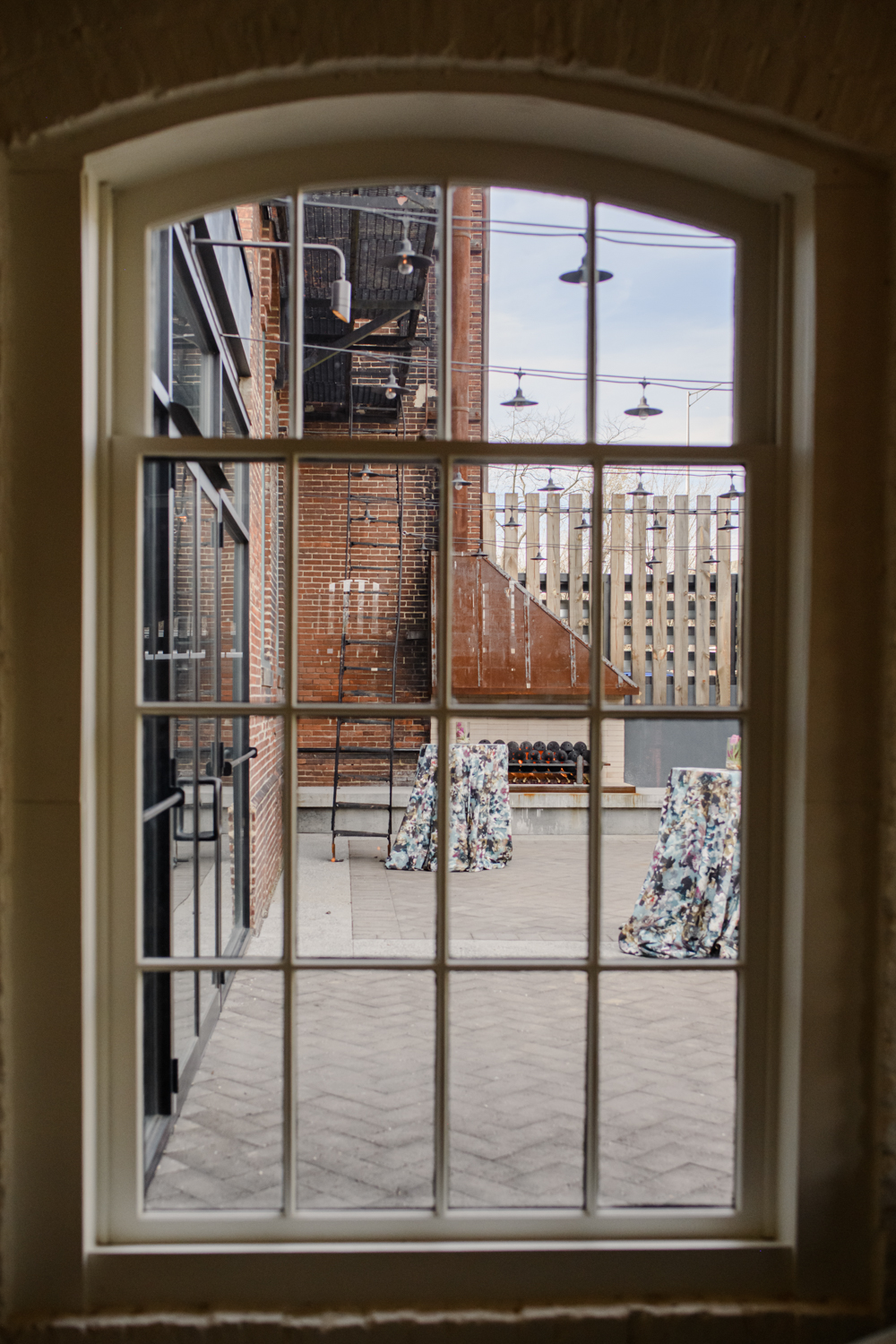 exterior of the Loom Baltimore through a window