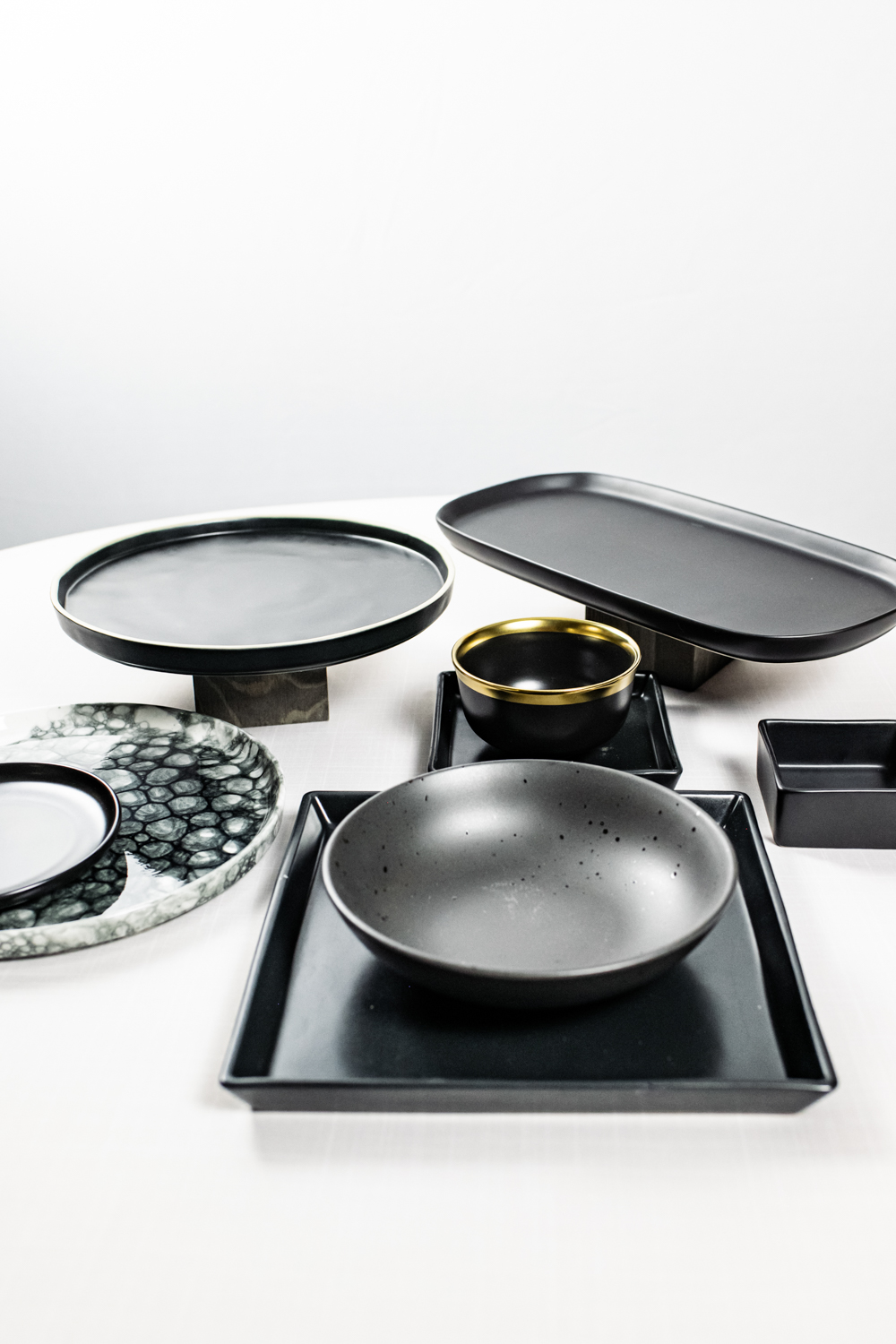 collection of serve ware and dishes for copper kitchen lookbook