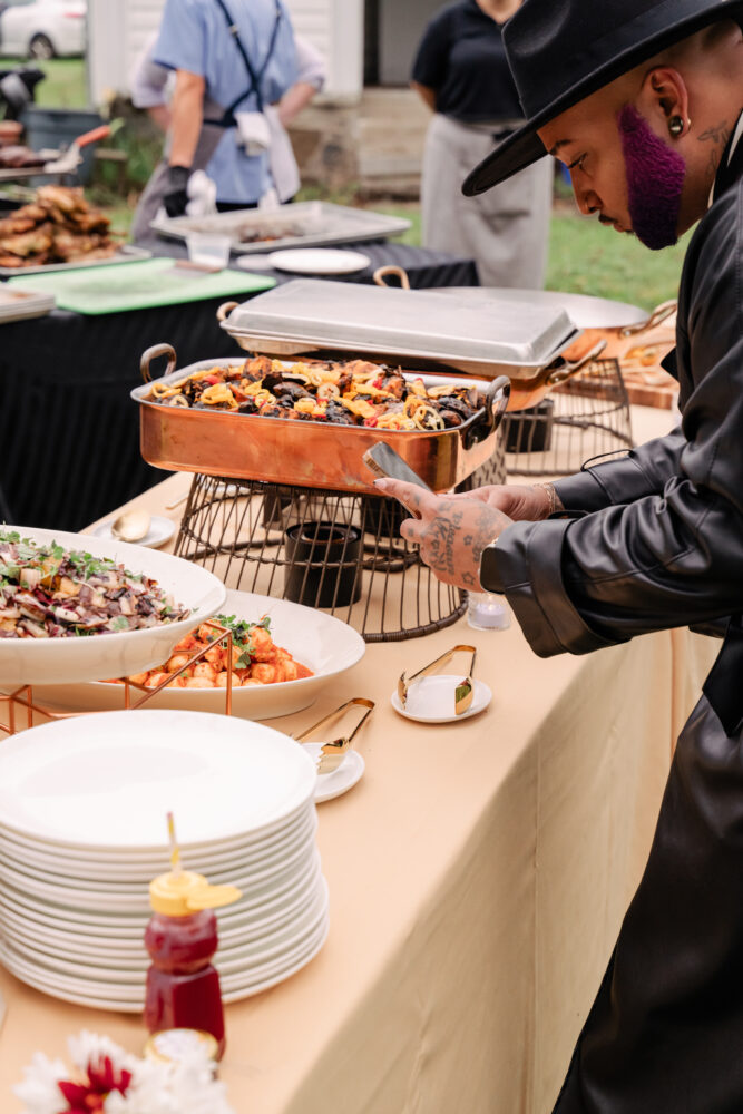 guests plating food from honey harvest buffet