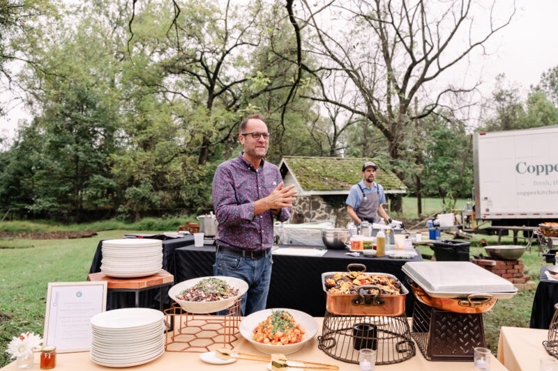 chef Kevin Miller welcoming guests at honey harvest buffet