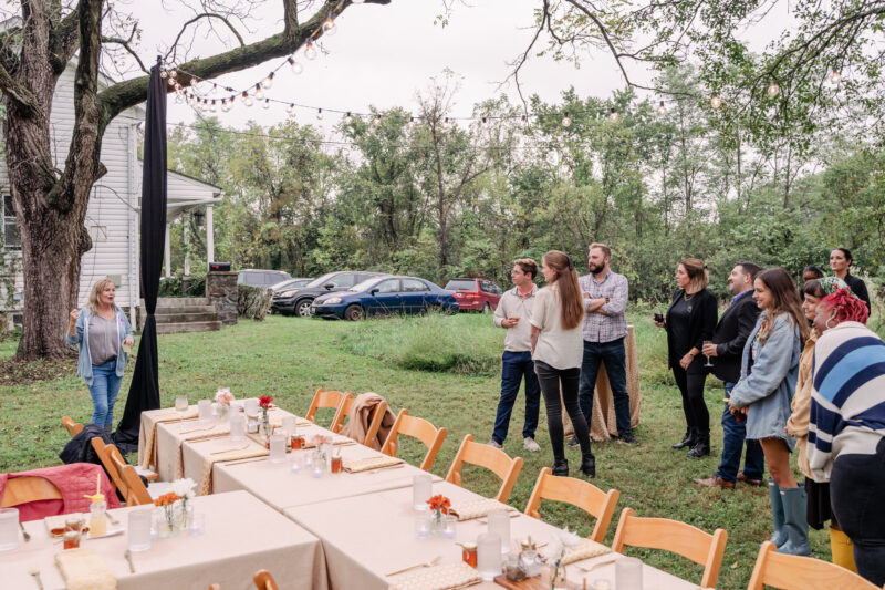 guests mingle at honey harvest event
