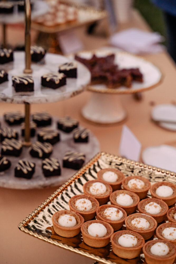 guests plating dessert from honey harvest buffet