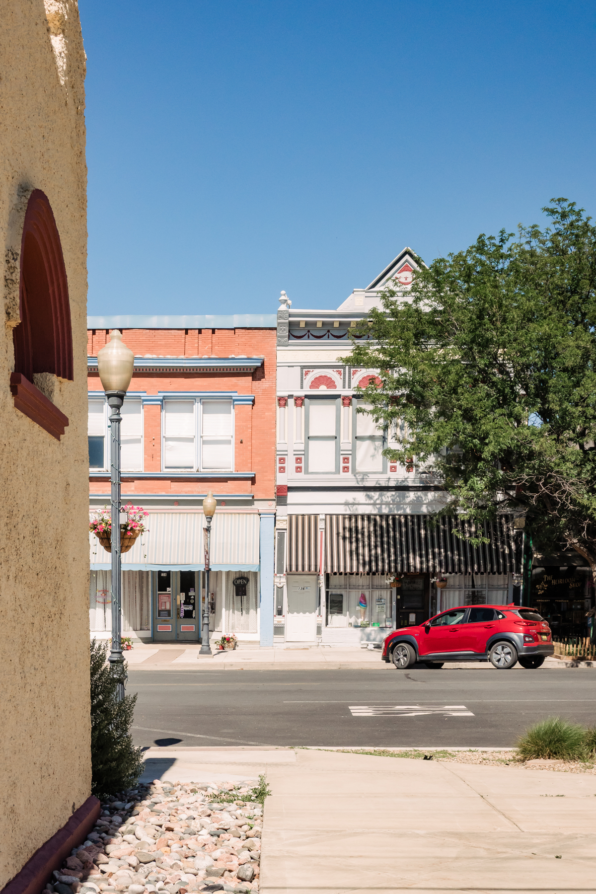 buildings in a town against a blue sky