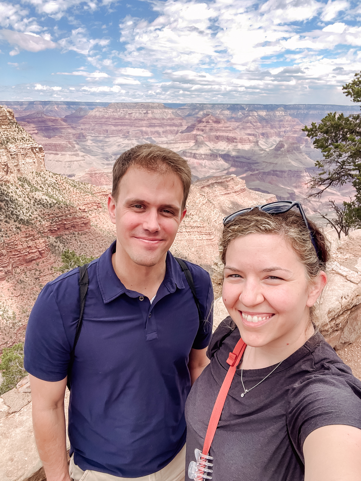 selfie in front of view of grand canyon