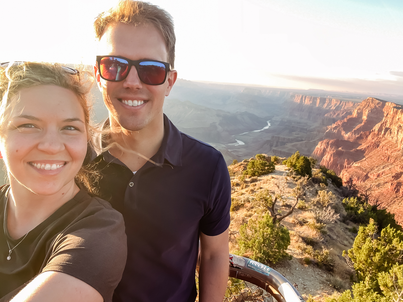 selfie of couple in front of grand canyon