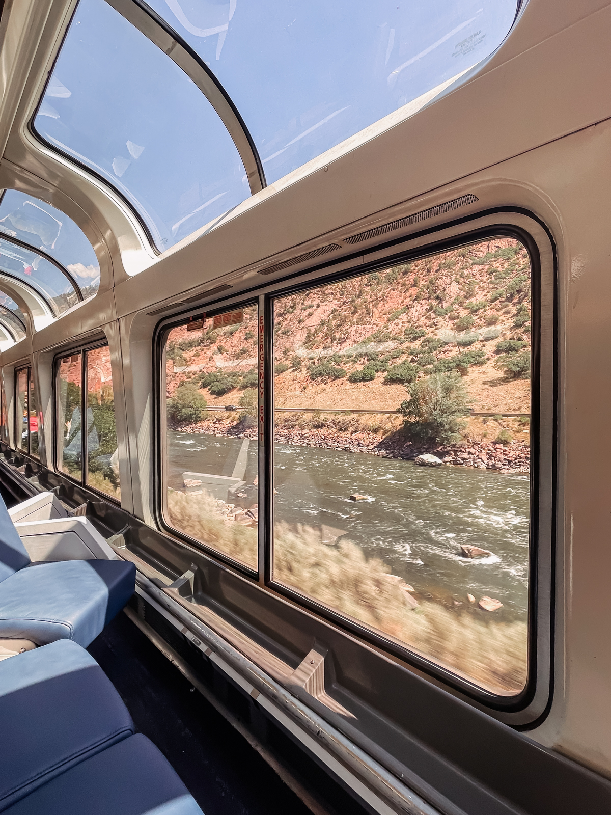 view of colorado river through train car