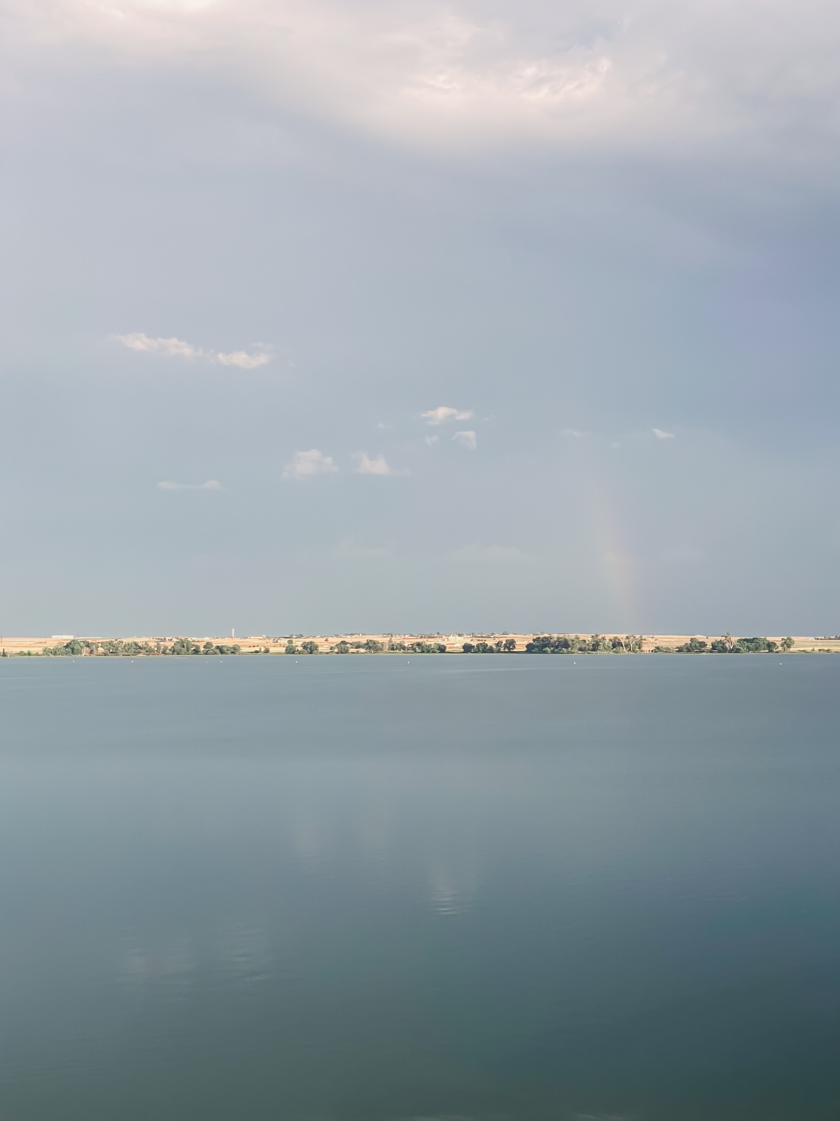 rainbow over a body of water