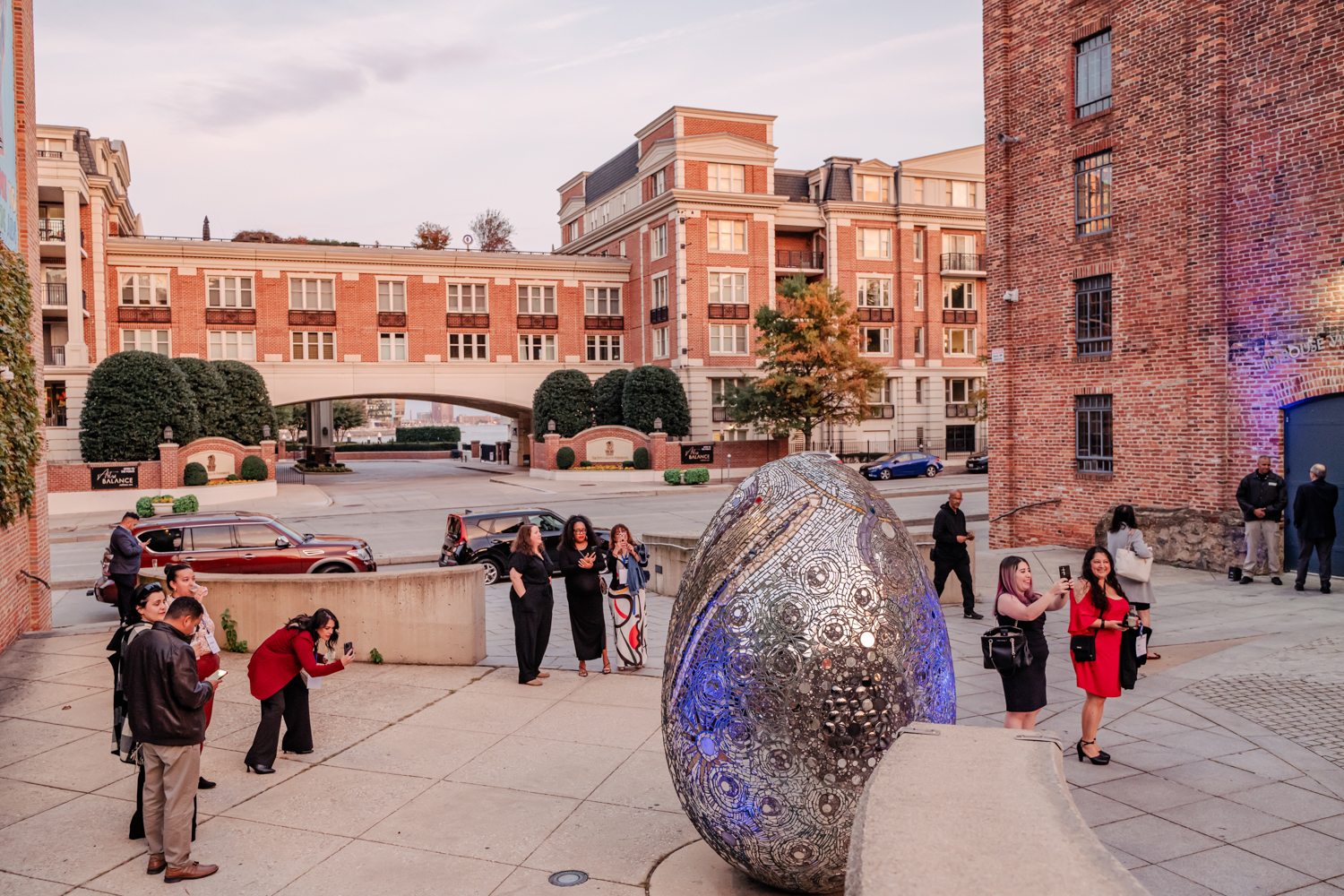 guests gathering outside the egg sculpture at AVAM