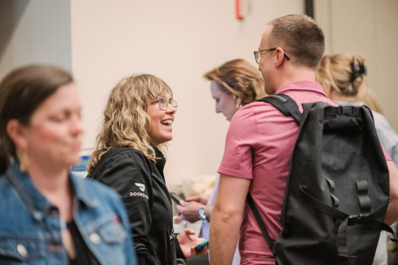 conference guests talking at refed summit