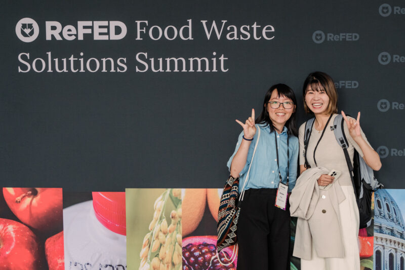 refed conference guests pose for photo