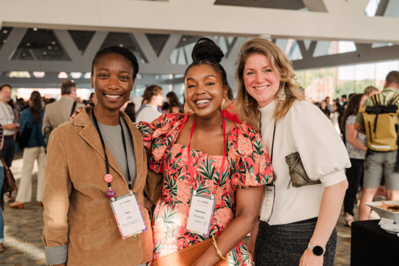 refed conference guests pose for photo