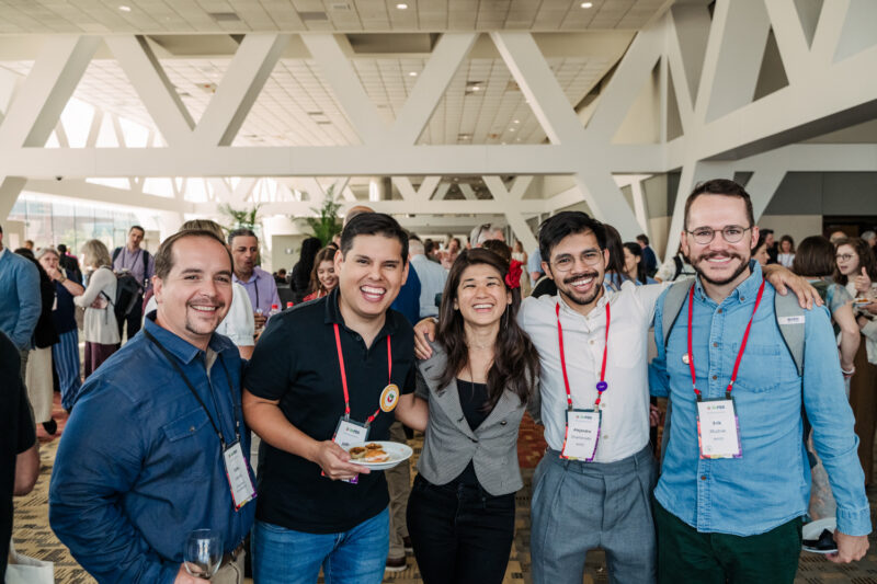 refed conference guests pose for photo
